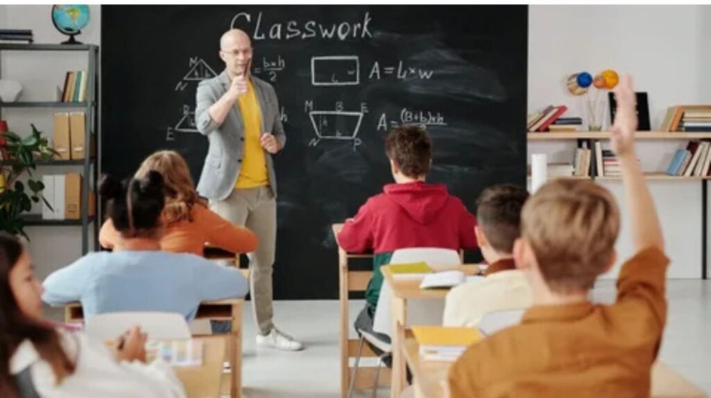 teacher giving lecture in a classroom.