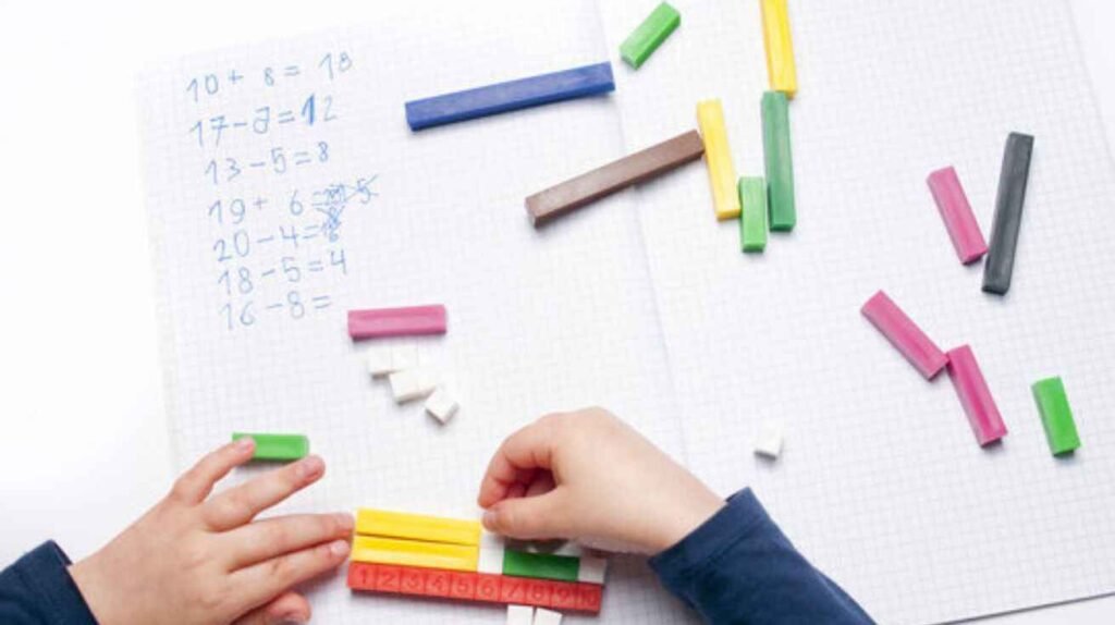 Student working on arithmetic problems, representing the math foundation of the 3 R’s.