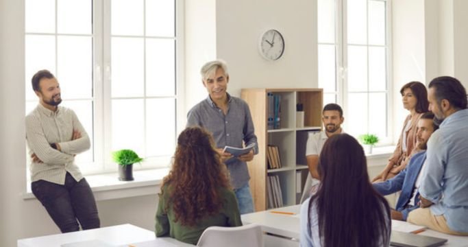 Student practicing for scholarship interview with a mentor or friend.